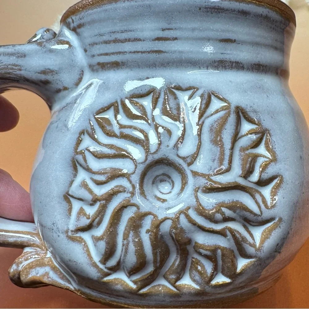 Artist Signed Wheel Spun Pottery mug. Handmade custom piece
